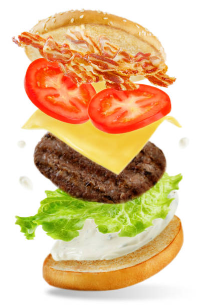 istock Flying meat Burger with mayonnaise splat 952556824