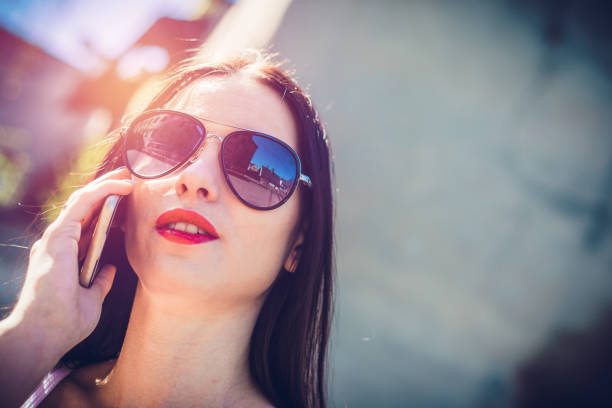 istock Attractive spontaneous woman talking on the phone. 952575294