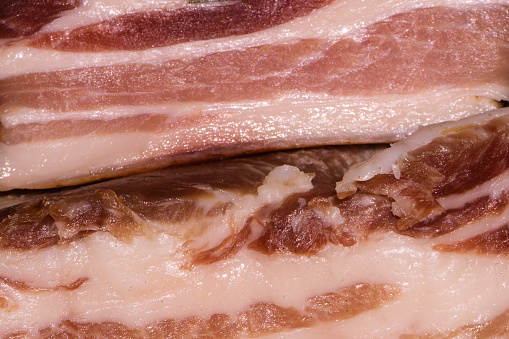 large juicy slices of fat bacon closeup