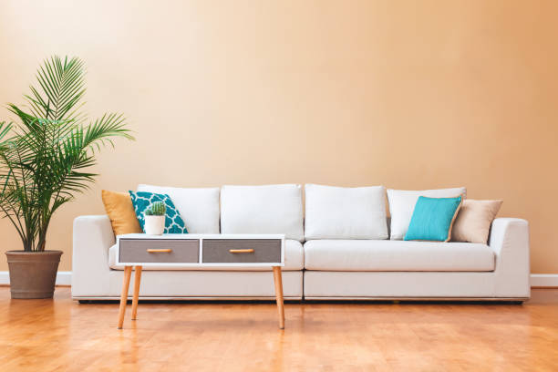 istock White couch in a large luxury home 952586790