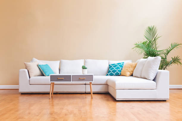 istock White couch in a large luxury home 952586796