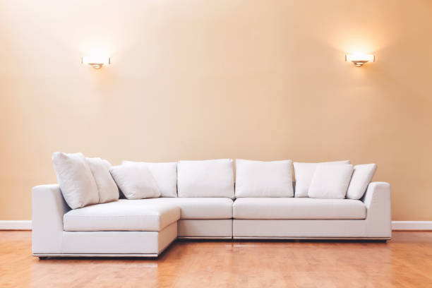 istock White couch in a large luxury home 952586824
