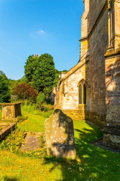 istock Old Medieval english Cemetery, gravestones, typical old British cemetery on a sunny day, 952604036