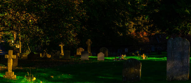 istock Old Medieval english Cemetery, gravestones, typical old British cemetery on a sunny day 952606548