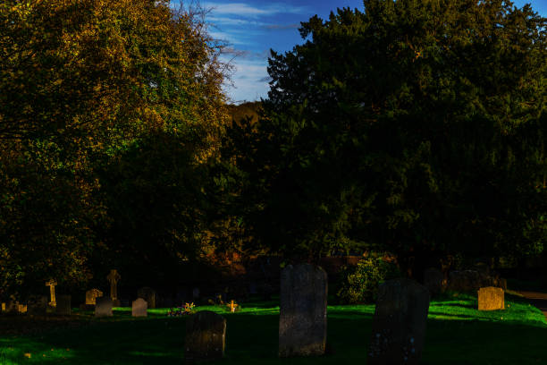 istock Old Medieval english Cemetery, gravestones, typical old British cemetery on a sunny day 952606564