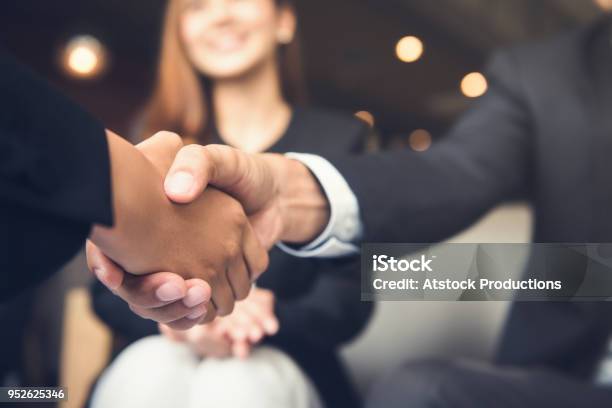 Businessmen Shaking Hands After Meeting In A Cafe Stock Photo - Download Image Now - Handshake, Business, Partnership - Teamwork