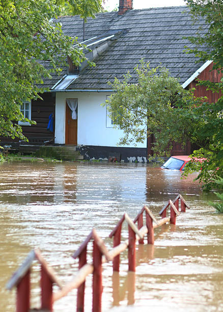 istock Residential home in rising floodwaters 95263826