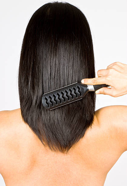 istock Woman Brushing Her Hair 95263889