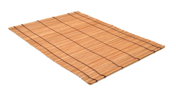 istock Close up of bamboo mat background isolated on white 952642616