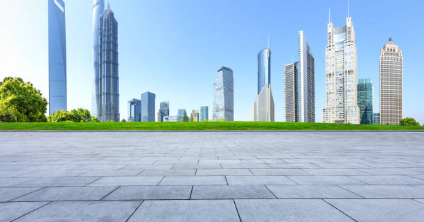 istock panoramic skyline and buildings with empty square floor in shanghai 952674422