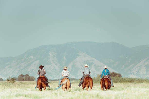 istock Group of friends horseback riding 952675208
