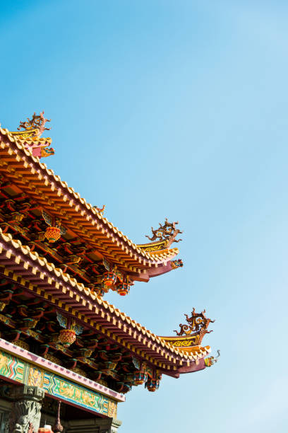 istock Chinese style temple roof under blue sky 952676052