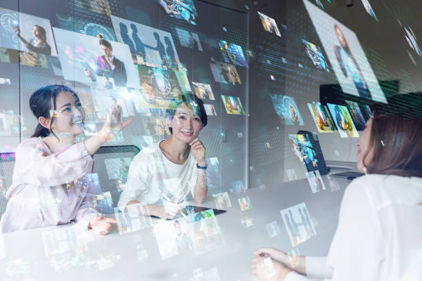 istock Group of people watching stereoscopic images. 952679556