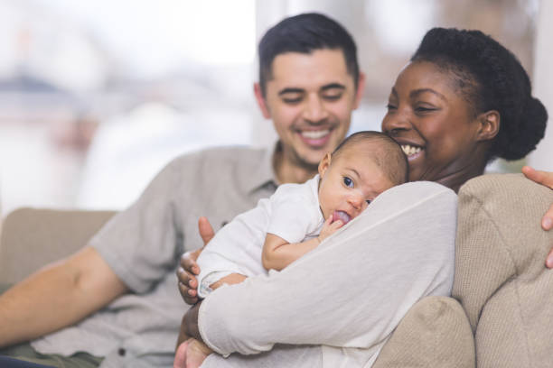 istock New Mom Holds Her Infant to Her Chest 952682250