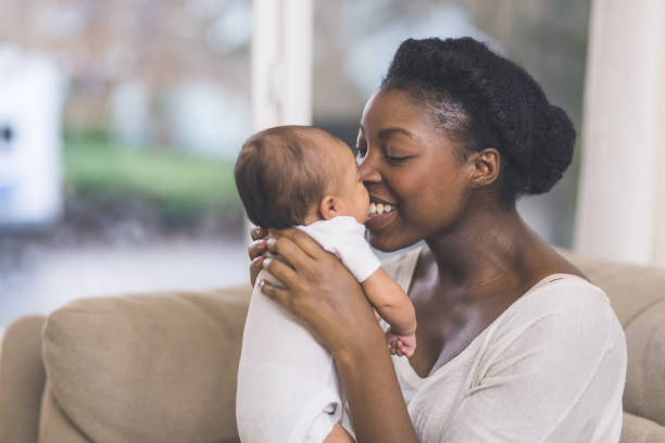 istock Mama holding her newborn baby 952682252