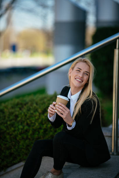 istock Coffee break in front of office building 952689880