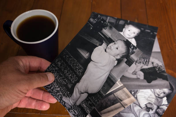 istock Looking at old photo's with nostalgia. 952697586