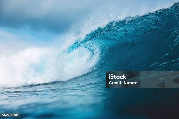 Ocean Blue Wave In Ocean Breaking Wave For Surfing In Bali Stock Photo - Download Image Now