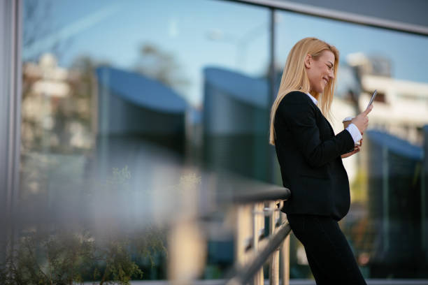 istock Business woman on cell phone 952701624