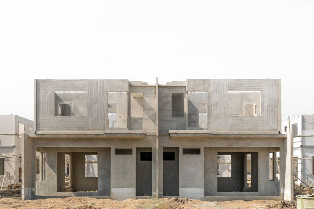 Building structure are made from prefabrication system.All pieces are made from high-strength concrete.Then assembled into a building.Isolated on white background.