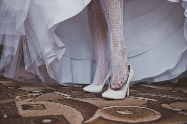 istock Under a dress of the bride 1018. 952712452