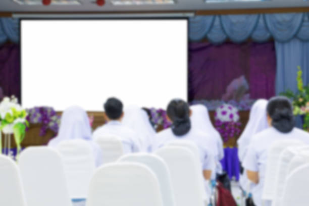 blur education of student seminar in the lecture room which has projector screen white with copy space add text