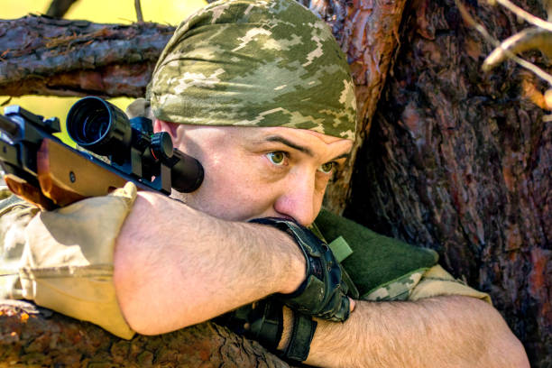 istock young man with an air rifle 952718998
