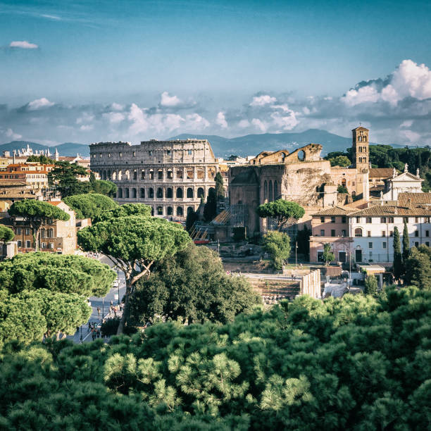 Rome Skyline with Colosseum and Roman Forum, Italy Rome, Italy city skyline with landmarks of the Ancient Rome ; Colosseum and Roman Forum, the famous travel destination of Italy. ancient rome photos stock pictures, royalty-free photos & images