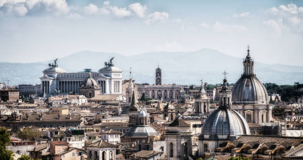 Rome skyline at the city center with panoramic view of famous landmark of Ancient Rome architecture, Italian culture and monuments. Historical Rome is the famous travel destination of Italy.