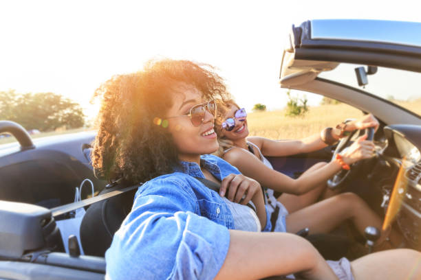 Girlfriends having fun on road trip
