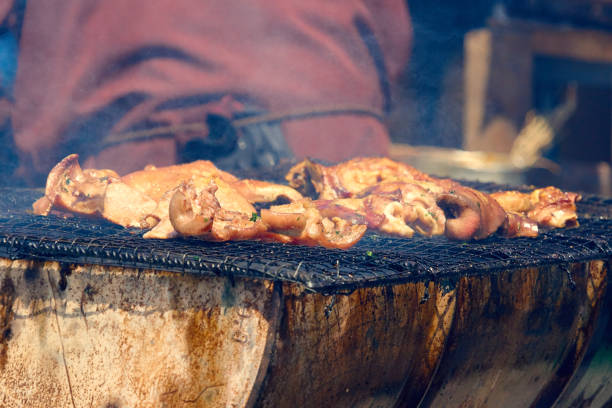 istock BBQ pork rosated in a barrel barbecue 952738528
