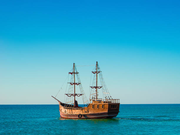 istock Wooden ship goes by the sea 952739312