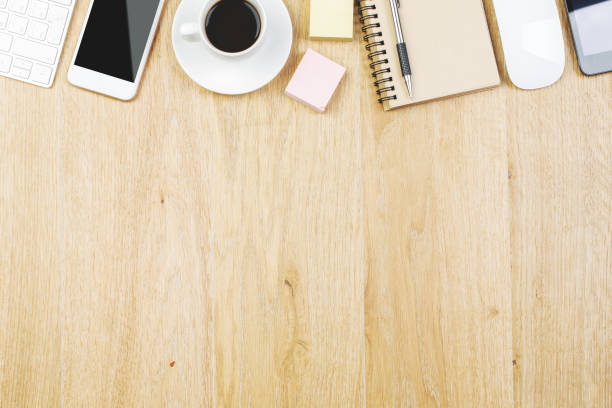 istock Wooden workplace with supplies and coffee 952739358