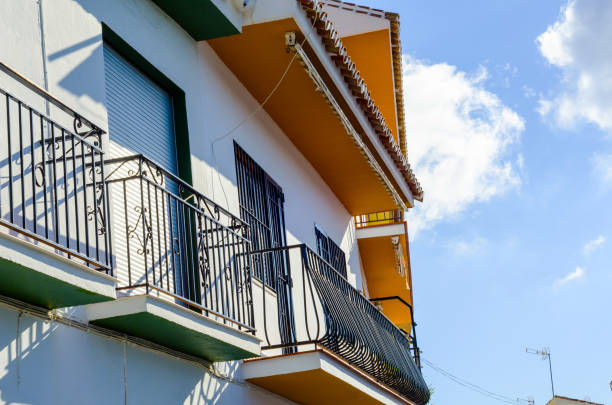 istock Stylish balcony with a metal railing, solid architectural element, a place of rest and relaxation, vintage decor 952740020