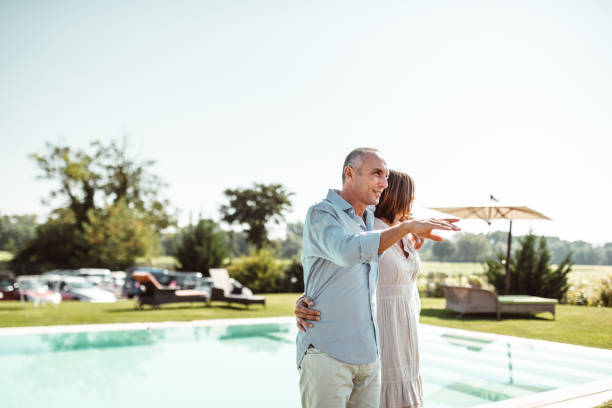 istock happiness couple walking in the garden 952742932