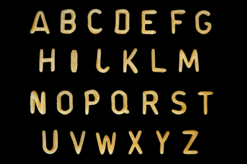 Alphabet soup pasta font. Typographic characters made from kids food.