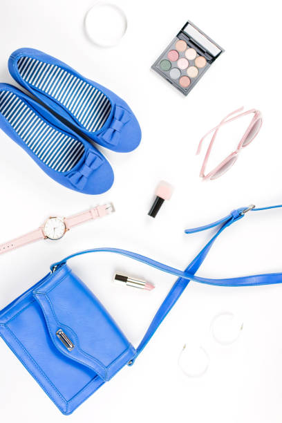 female summer fashion accessories flat lay with flats, purse, sunglasses and cosmetics - earring multi colored shoe jewelry imagens e fotografias de stock