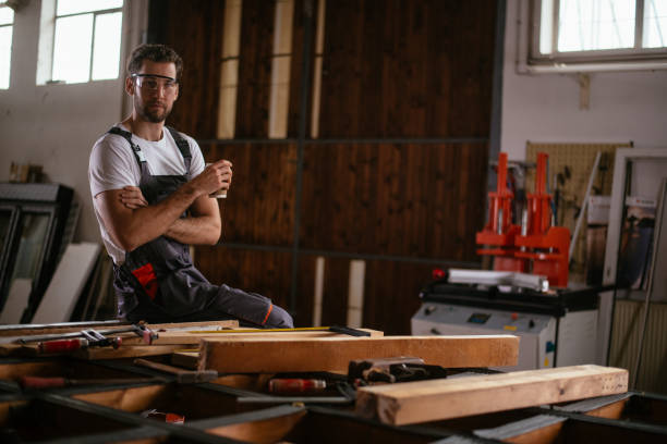 istock Male carpenter in his craft workshop 952749148
