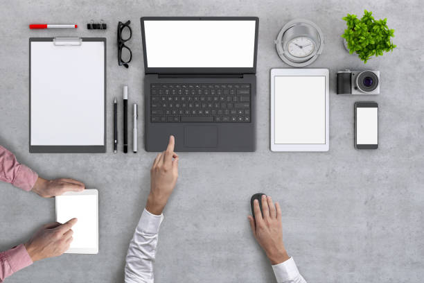 istock Business people working in office knolling overhead view 952755068