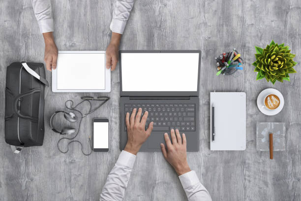 istock Business people working in office knolling overhead view 952755126