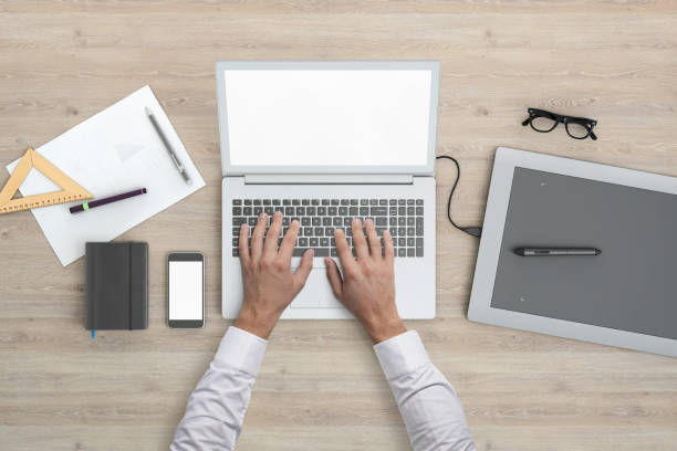 istock Architect designer working on office desk knolling overhead view 952755176