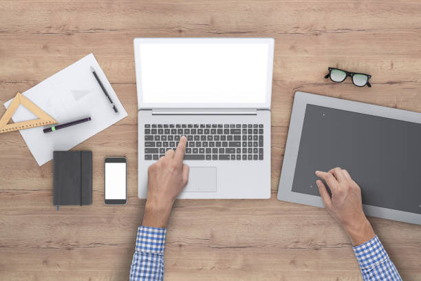 istock Architect designer working on office desk knolling overhead view 952755180