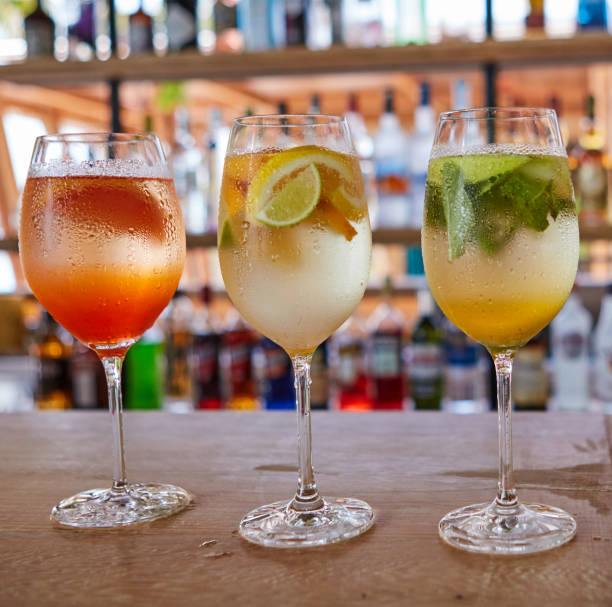 istock Refreshing Tropical Cocktails Drinks and fruit On Bar Counter Close-Up 952771536