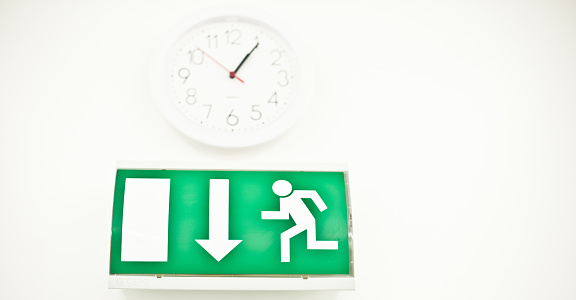 Clock Exit Sign Warning Sign Emergency Exit Sign Under A Wall Clock Stock Photo ...