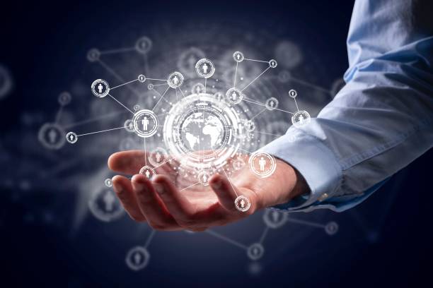 istock Businessman holding social media network icons structure 952777032