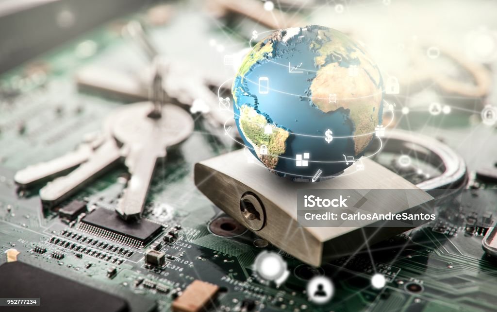 Padlock on computer circuit board.Security concept.Elements of this image furnished by NASA Accessibility Stock Photo