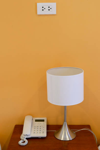 istock Bedroom desk light and phone 952778140