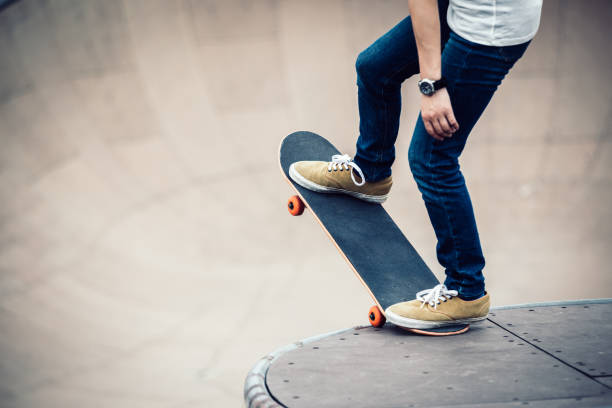 istock Skateboarder sakteboarding on skatepark ramp 952778550