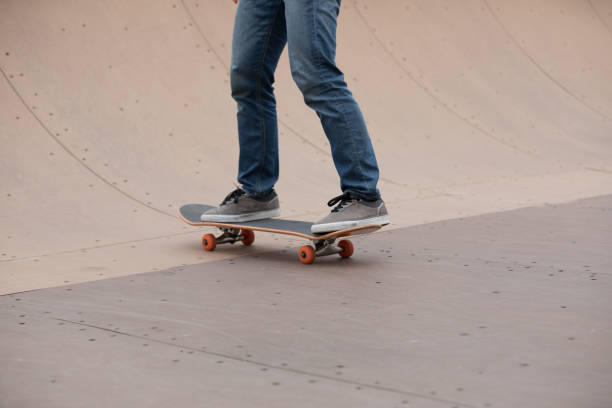 istock Skateboarder sakteboarding on skatepark ramp 952778904