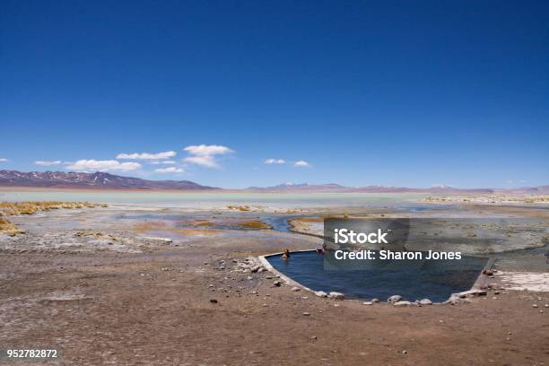 Tourists At The Polques Hot Springs In The Chalviri Desert Bolivia Stock Photo - Download Image Now